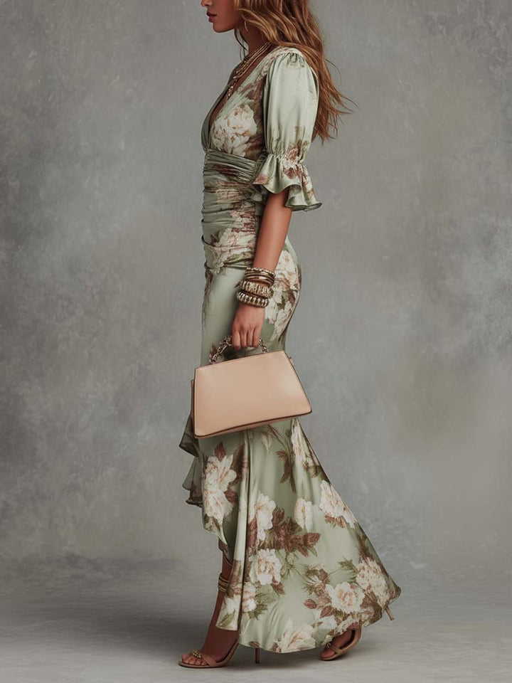 Anna Long asymmetric green satin dress with a V-neckline