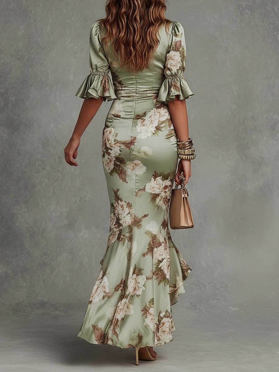 Anna Long asymmetric green satin dress with a V-neckline